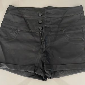 Bebe Leather high waisted shorts size 27 with a 2” inseam